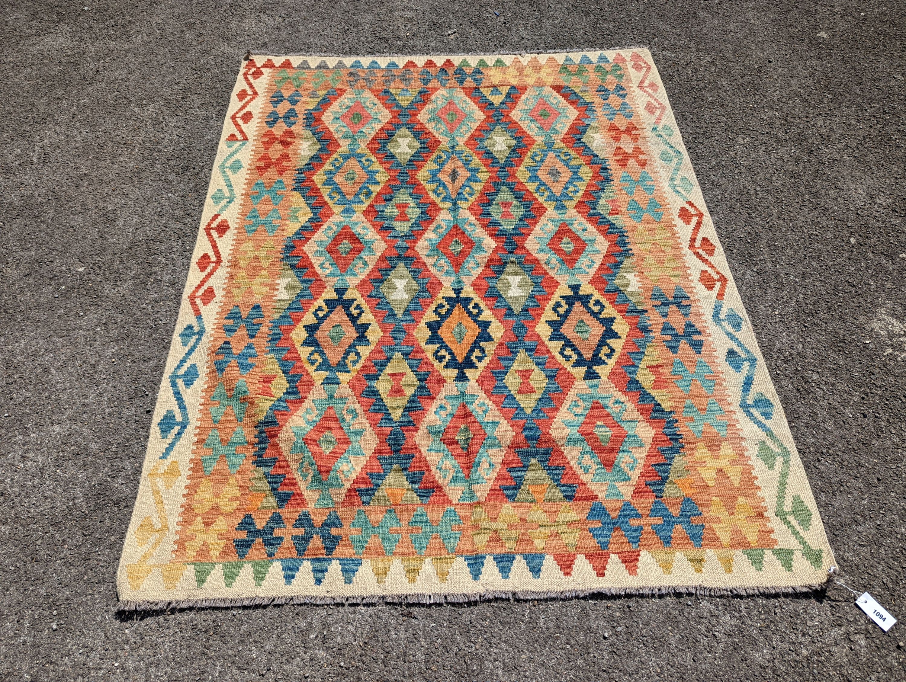 An Anatolian design polychrome geometric flatweave carpet, 196 x 156cm